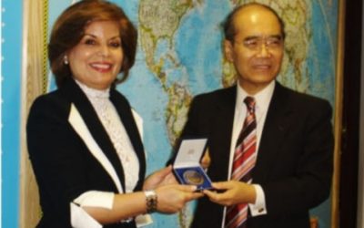 Mehri Madarshahi, President of Melody for Dialogue among Civilizations Association receives UNESCO’s 60th anniversary medal from the Director-General Koichiro Matsuura on 11 December 2006.